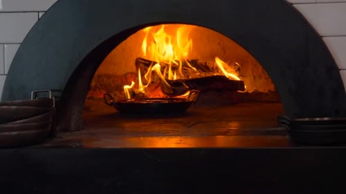 Roaring Fire in a Traditional Pizza Oven