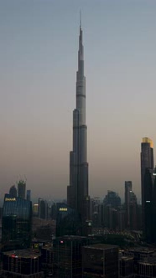Vertical time lapse of downtown Dubai with Burj Khalifa after sunset, UAE