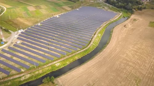Aerial View of Solar Power Plant Electric Panels for Producing Clean Ecologic Energy