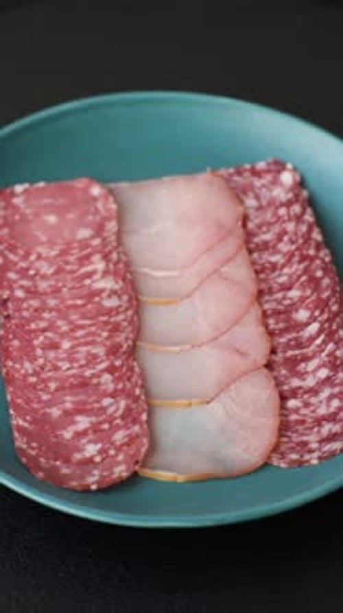 Meat Slices on a Blue Plate