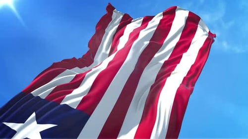Liberia Flag Waving in Realistic 3D Against Blue Sky