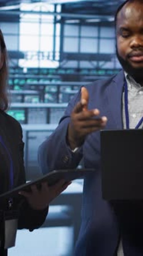 Vertical Video Teamworking Colleagues Doing Checkup in Data Center