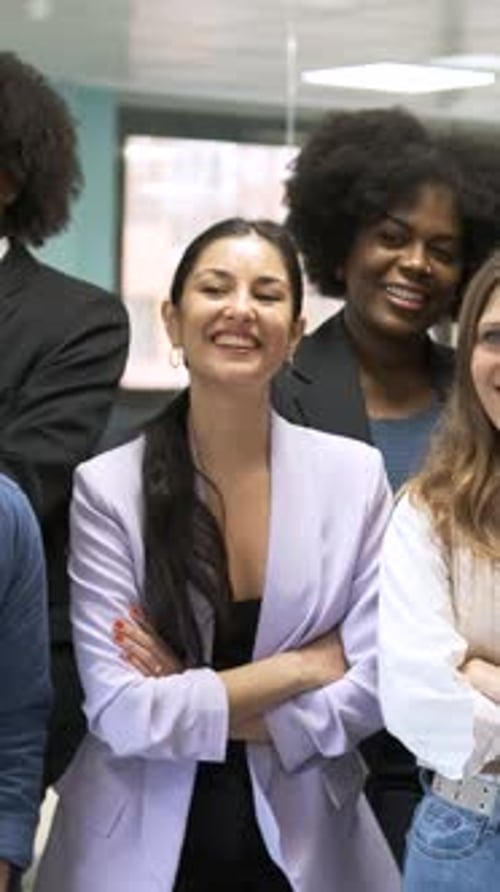 Contented Multiethnic Business Team Posing in Creative Office