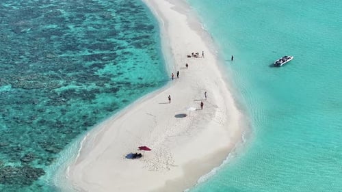 Aerial view of sandbar with people, Maldives.