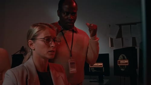 Business Professionals React to Critical Error on Computers