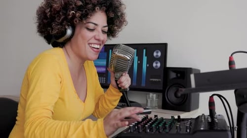 Music engineer, Producer singer record with vintage microphone at production studio