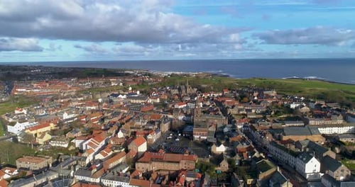 Aerial push-in shot above Berwick Upon Tweed heading Northeast