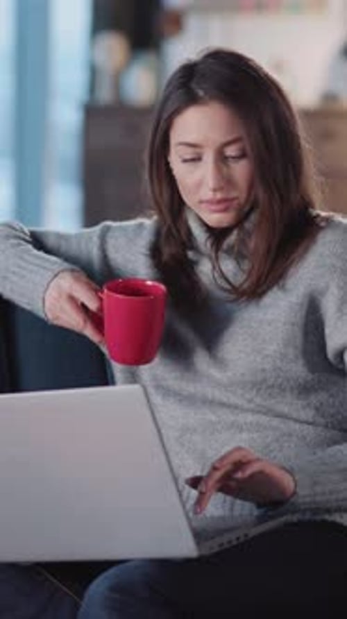 Pretty Young Adult Business Lady Working Fromhome Using Computer Portable Laptop Device Drinking