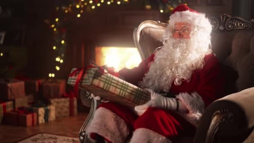 Santa Claus with Gift in Cozy Christmas Setting
