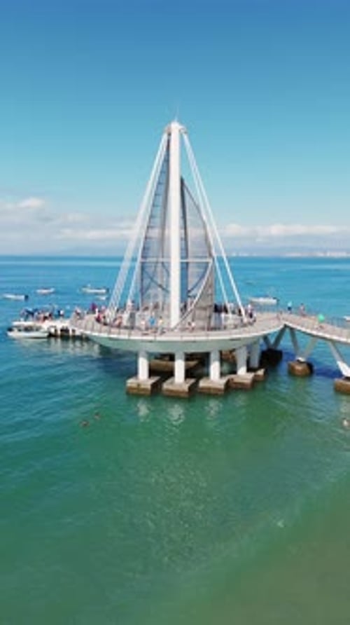 Drone Rotating Over The Puerto Vallarta Pier, Mexico. Vertical Video