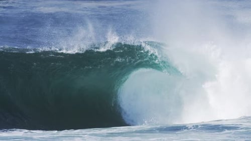 Crashing ocean wave with mist and glowing texture