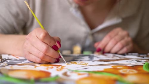 Woman Painting by Numbers at Home, Close Up