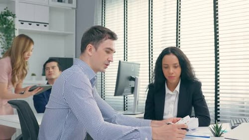 Group of young attractive businessman and woman people work in office.