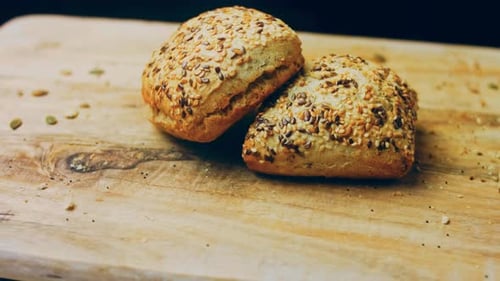 Two Freshly Baked Square Loaves of Bread with Seeds
