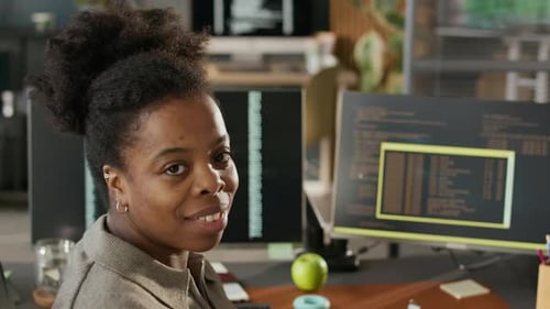 Portrait of Young Black Female Software Developer in Modern Programmers Office