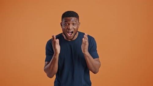 Young Man Expressing Joy and Surprise