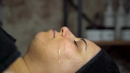 Adult Receiving Facial Serum Treatment Close Up