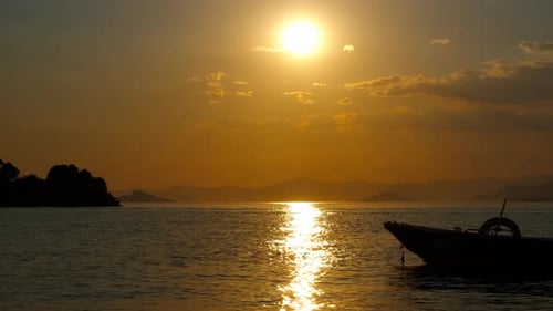 Sunset Dramatic Sky Over Lonely Boat