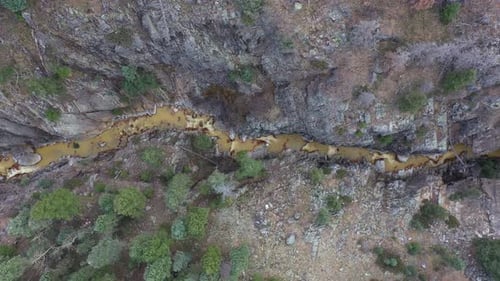 4K Rocky Mountains River Aerial going down