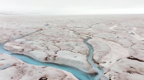 Icecap Arctic Meltwater Blue Channels Flowing To The Arctic Ocean, Aerial View