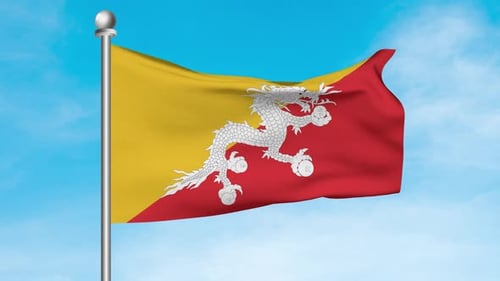 Drapeau du Bhoutan flottant dans le ciel bleu, vue de face