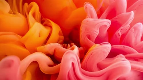 Vibrant Ink Swirls in Water: Abstract Fluid Motion Background