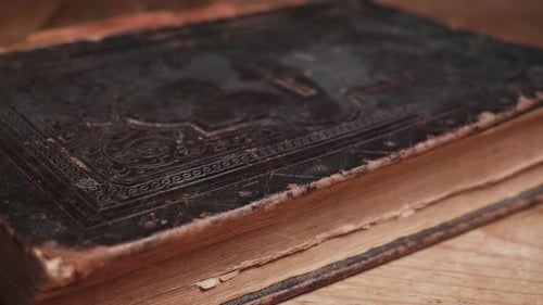 Close‑Up of Weathered Bible cover Book 4k