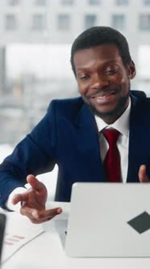 Smiling Office Worker Talking with Colleague or Partner Shaking Hands Vertical Portrait of Black Man