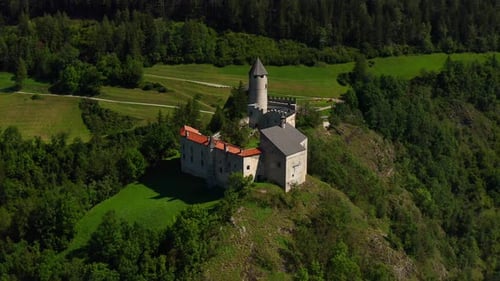 Castle On Mountaintop Near Vipiteno Italian Village In Trentino-Alto Adige Bolzano Italy. Aerial Pul