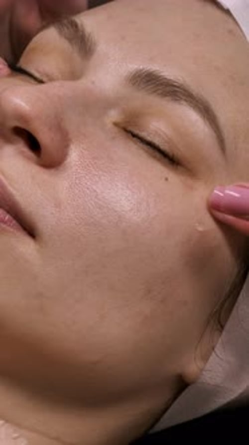 Relaxing Facial Massage for Beautiful Woman Indoors