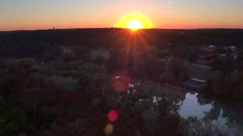Beautiful Sunset Over Green Hills and River, Aerial Drone Aerial