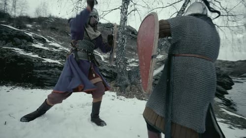 Armored Warriors in a Snowy Medieval Battle
