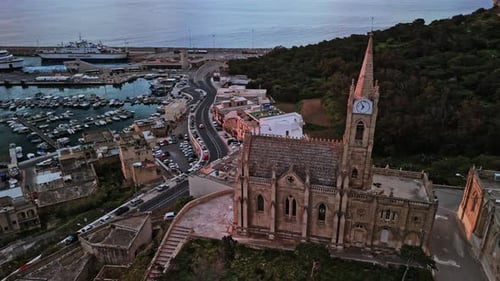 Stunning aerial view of Malta's historic architecture at sunset