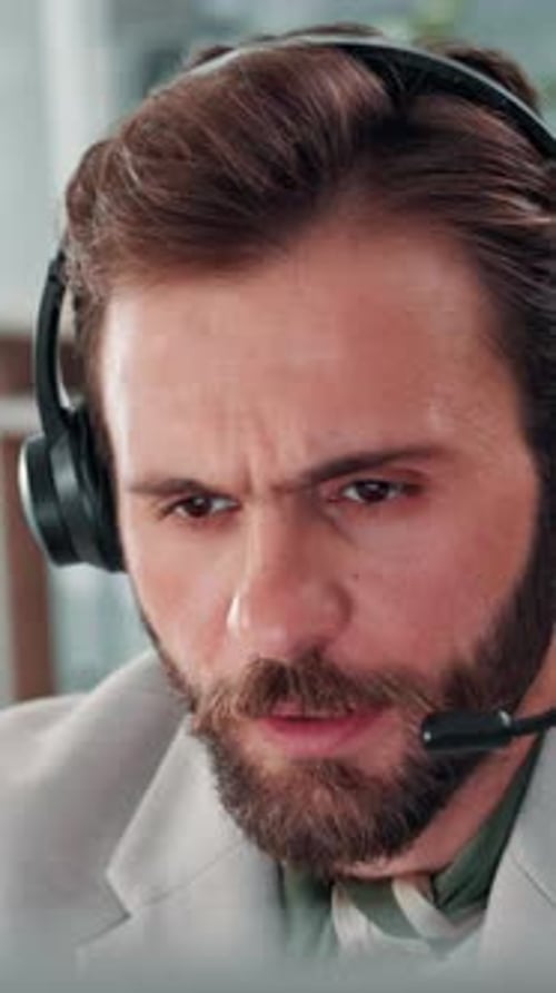 Headset, man and customer service agent in office with communication, contact us or helpdesk