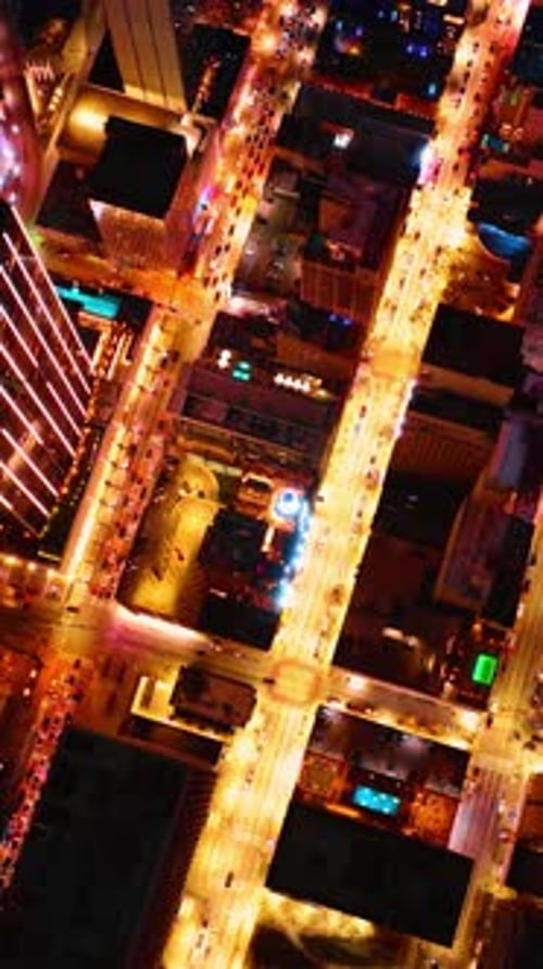 Bright illumination of the metropolis at night. View of the Dallas streets and roads from top.