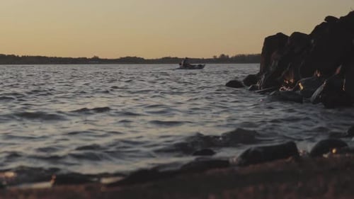 Kayaking training on the lake, paddling man practice kayaking with their backs turned in the shade a