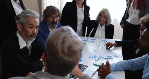 Multiracial Business People Working Inside Bank Office - Meeting and Startup Concept Analysis