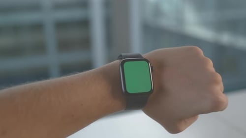 Man Checks Up App Notification on Watch with Blank Display