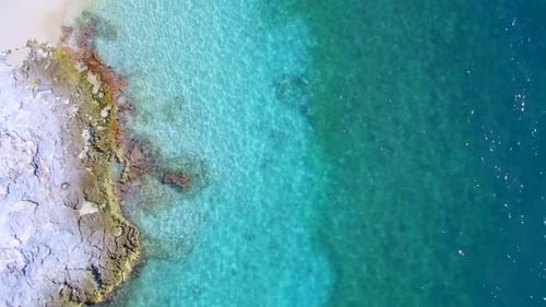 Blue island tropical paradise aerial drone view of a stunning summer coastline