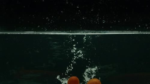 Tomato Plunges Into Water Slow Motion Prores 422 Bmpcc4k