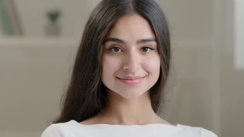 Smiling Young Woman Portrait Close-up Indoors
