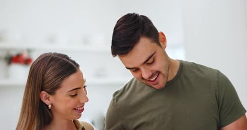 Couple Smiling Together at Home