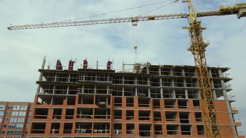 Tower Cranes at High Residential Apartment Buildings Construction Site Real Estate Development