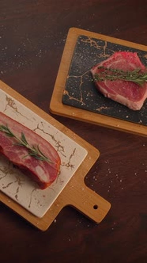 Fresh Cuts of Meat Arranged Artistically on Rustic Wooden Boards Ready for Cooking and Enjoyment