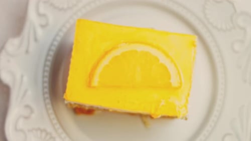 Waviness Effect of A Piece of Tangerine Cake with Jelly