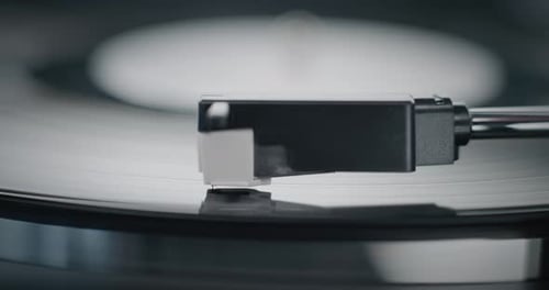 Stylus Needle Touching Grooves Playing Sound on Vinyl Record Player