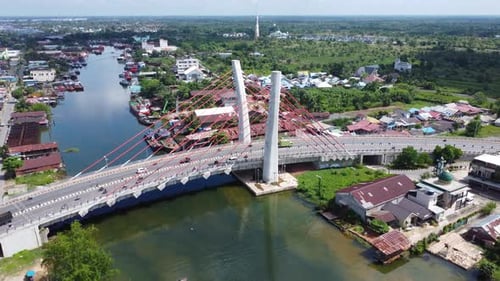 Aerial view of the Sei Alalak Bridge located in Banjarmasin which is known as the first arched bridg