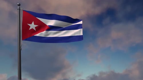 Cuban Flag Waving on a Pole Against a Cloudy Sky