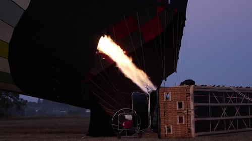Hot Air Balloon Inflation at Colorful Sunrise