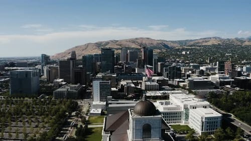 Drone shot flying through Salt Lake City's downtown sector.